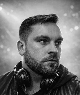 Portrait of Vextra wearing headphones
